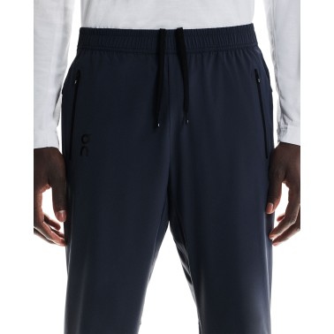 ON RUNNING TRACK PANTS
